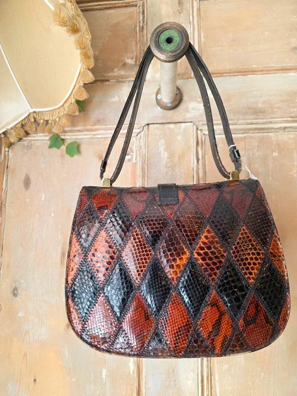 Vintage 1960s Genuine leather Patchwork Bag Stirrup Buckle