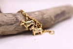 Load image into Gallery viewer, Vintage dog charm bracelet -1950s  gold tone novelty costume jewellery

