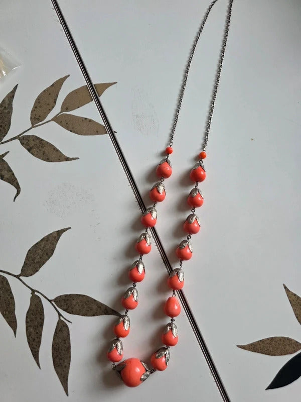 Vintage 1930s 1940s long Coral-Coloured Glass Bead Necklace with Silver Tone Leaf Caps