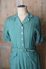 Load image into Gallery viewer, Vintage 1940s dress original green WW2 polka dot button down side zipper.
