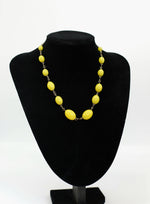 Load image into Gallery viewer, 1930s glass necklace - Moulded Graduating beads - yellow statement
