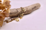 Load image into Gallery viewer, Vintage Wales charm bracelet - gold tone costume jewellery
