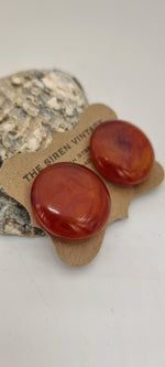 Load image into Gallery viewer, Vintage 1940s bakelite amber clip on earrings
