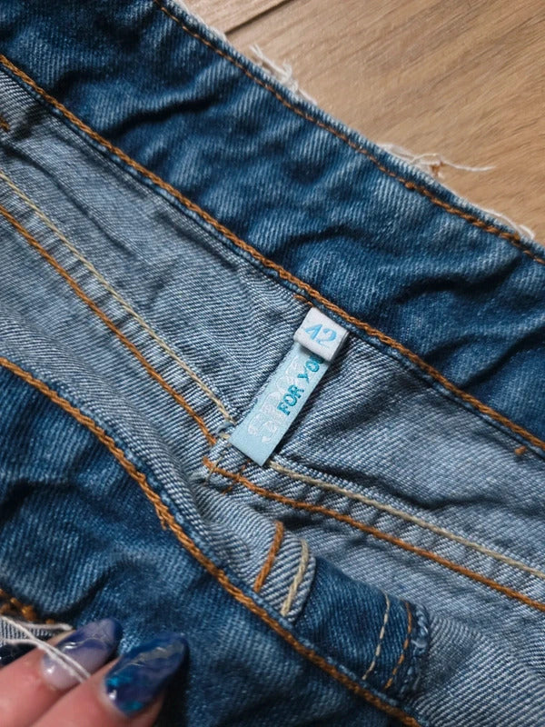 Vintage Y2K Acid Wash Denim Mini Skirt | Double Button Waist | UK 10–12
Description