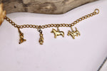 Load image into Gallery viewer, Vintage dog charm bracelet -1950s  gold tone novelty costume jewellery
