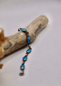 Vintage 1930s silver tone bracelet - foil back glass - blue