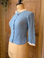 Load image into Gallery viewer, Vintage 1950s Hand-Knitted Powder Blue Cardigan with White Trim – UK 10/12
