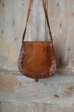 Load image into Gallery viewer, Vintage early 1970s brown tooled leather shoulder bag
