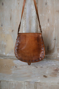 Vintage early 1970s brown tooled leather shoulder bag