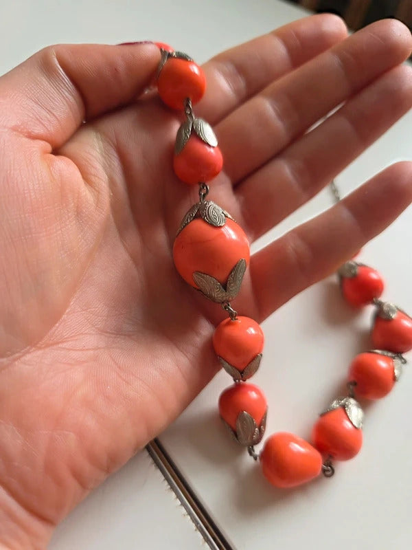 Vintage 1930s 1940s long Coral-Coloured Glass Bead Necklace with Silver Tone Leaf Caps