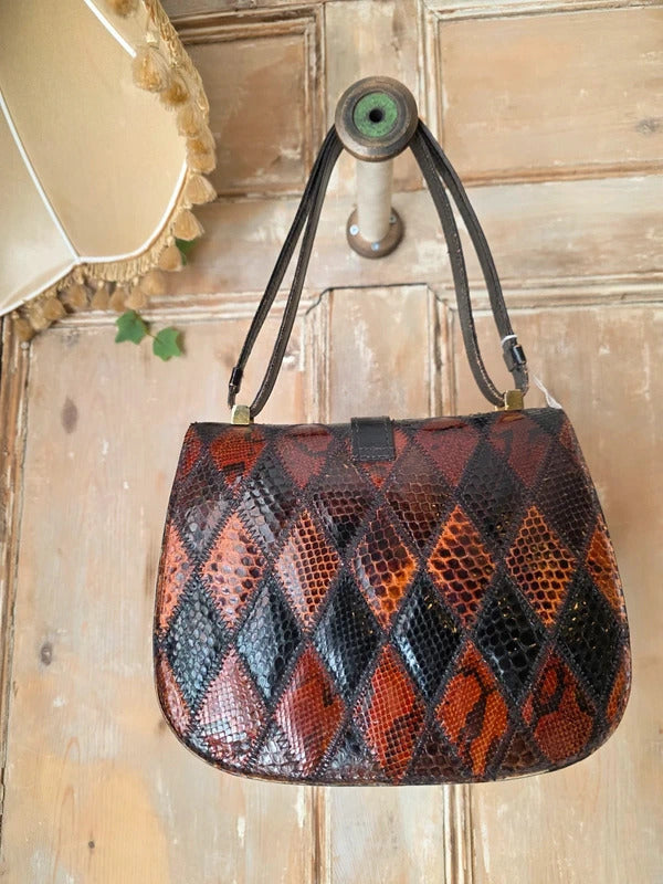 Vintage 1960s Genuine leather Patchwork Bag Stirrup Buckle