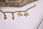 Load image into Gallery viewer, Vintage dog charm bracelet -1950s  gold tone novelty costume jewellery
