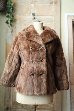 Load image into Gallery viewer, Vintage 1960s Musquash Fur Coat – Double Breasted – Driver&#39;s Length – Brown
