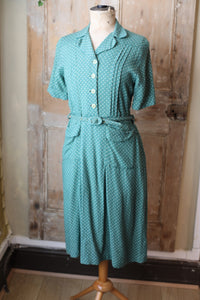 Vintage 1940s dress original green WW2 polka dot button down side zipper.