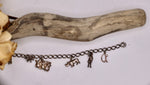 Load image into Gallery viewer, Vintage sterling silver 1960s charm bracelet - silver charms link
