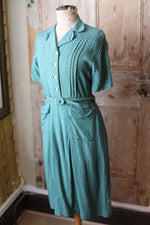 Load image into Gallery viewer, Vintage 1940s dress original green WW2 polka dot button down side zipper.
