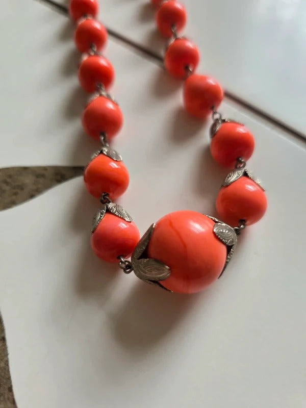 Vintage 1930s 1940s long Coral-Coloured Glass Bead Necklace with Silver Tone Leaf Caps
