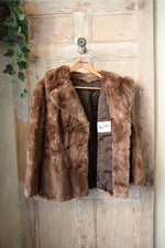 Load image into Gallery viewer, Vintage 1960s Musquash Fur Coat – Double Breasted – Driver&#39;s Length – Brown
