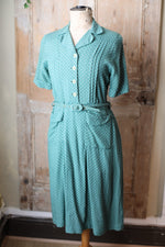 Load image into Gallery viewer, Vintage 1940s dress original green WW2 polka dot button down side zipper.
