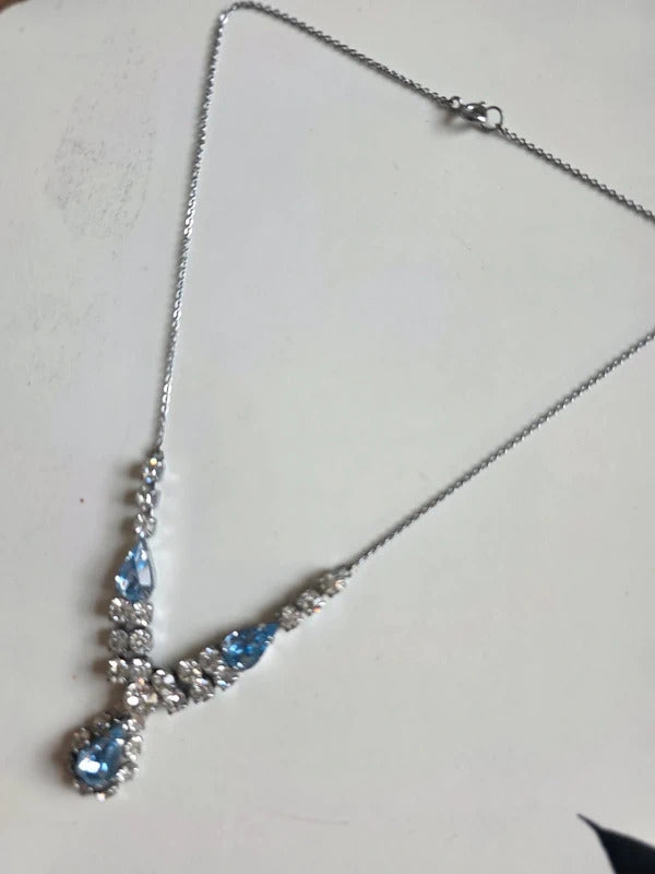 Vintage 1950s Blue Rhinestone Drop Necklace
Description: