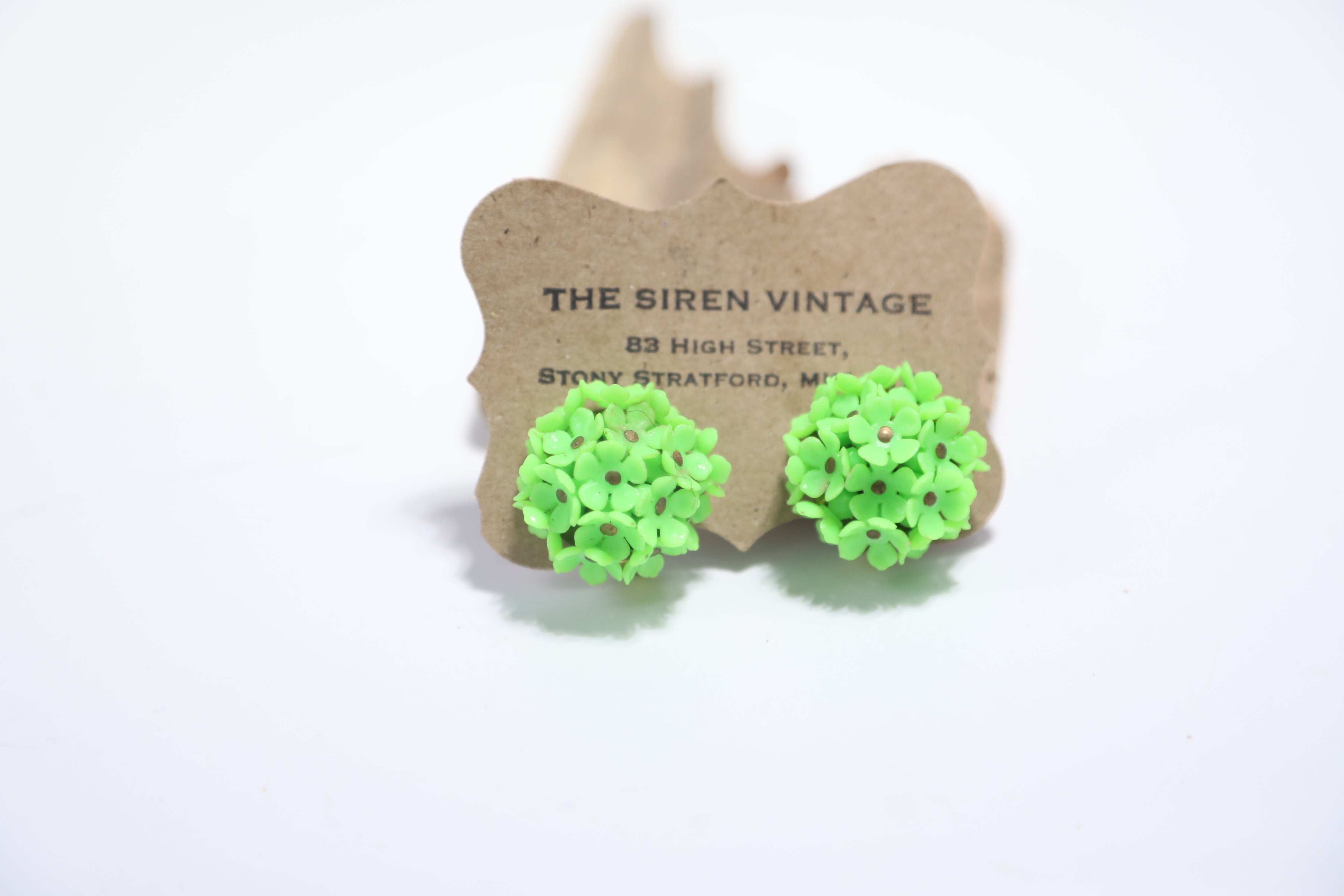 Vintage 1950s floral green bold clip on earrings