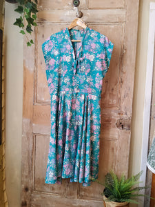 Vintage 1970s does 1950s floral fit and flare dress.