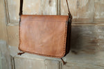 Load image into Gallery viewer, Vintage 1970s Tan Brown Tooled REAL Leather Crossbody Saddle Bag Boho Festival
