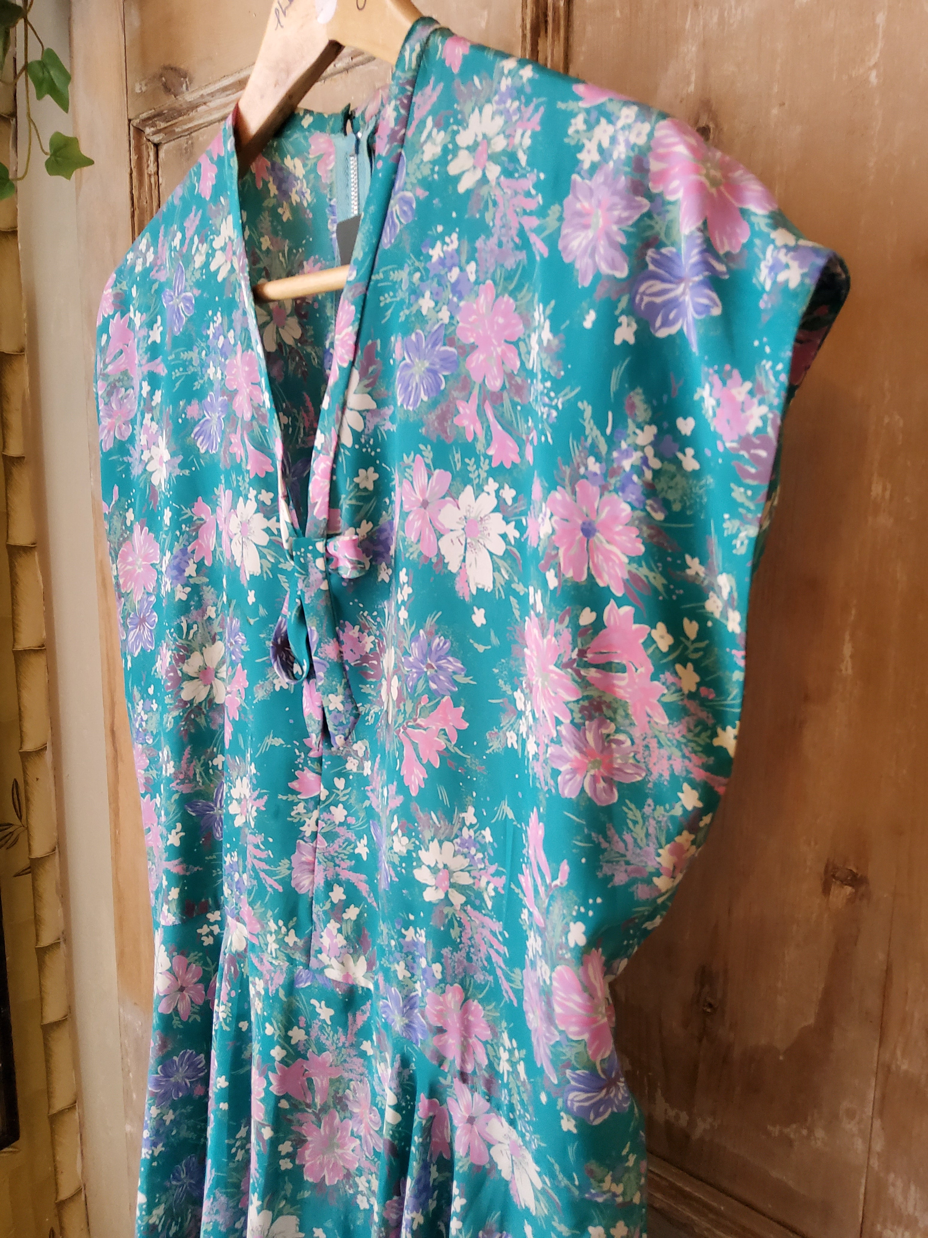 Vintage 1970s does 1950s floral fit and flare dress.